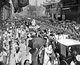 China: A military parade on bustling Nanking (Nanjing) Road, 1906.